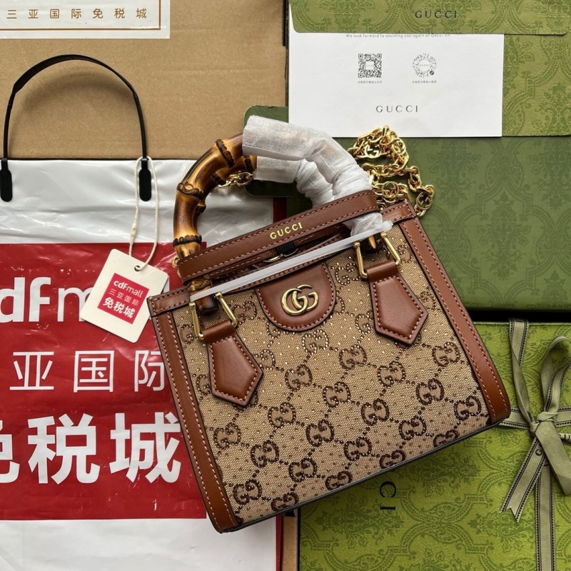 G*u*i top handle bags